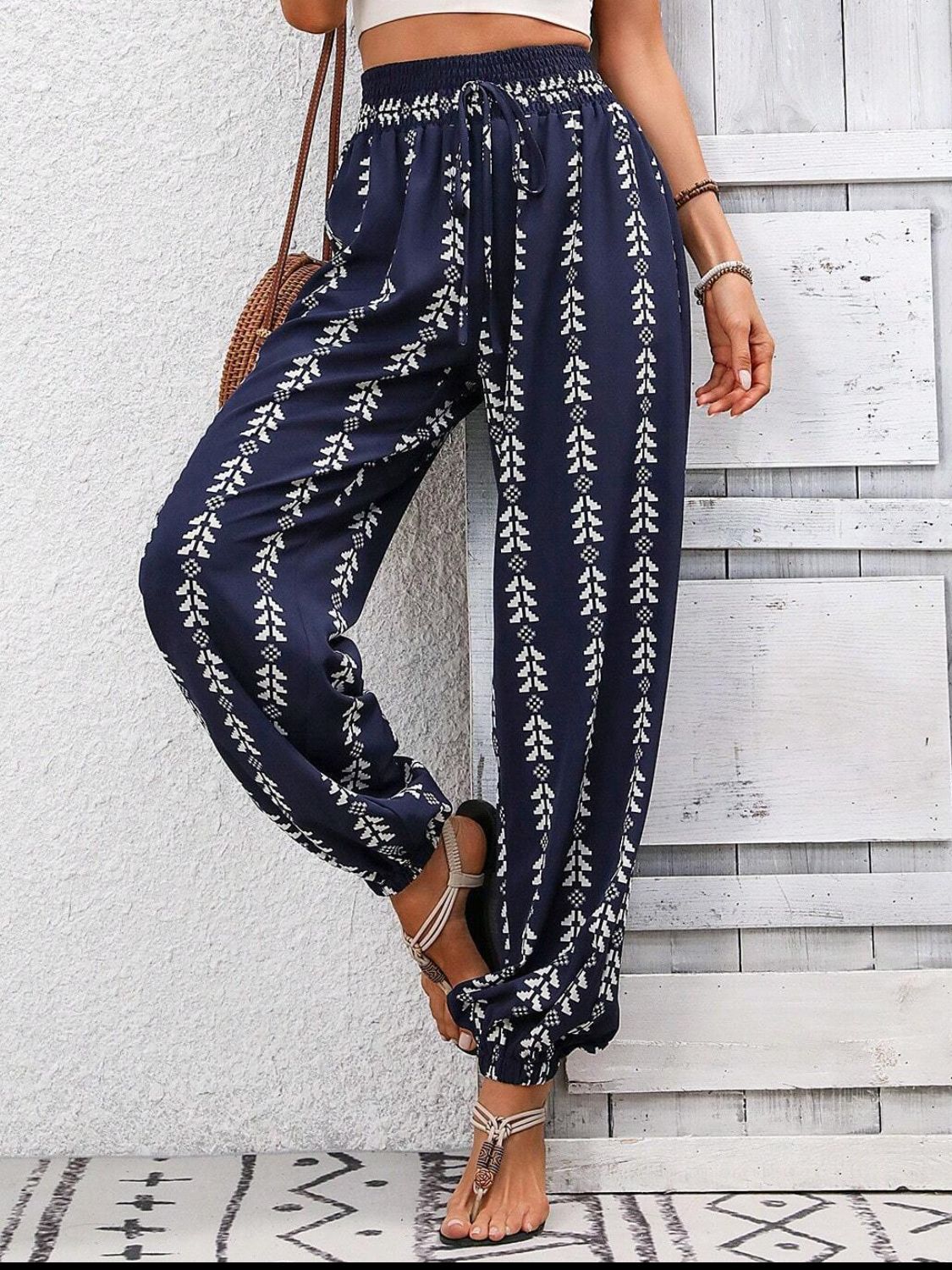 Navy boho chic drawstring pants with intricate pattern