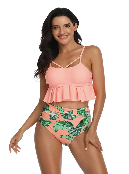 Dive into style with our Tropical Print Ruffled Two-Piece Swimsuit. Perfect fit, vibrant colors, and ultimate comfort for your sunny getaways.