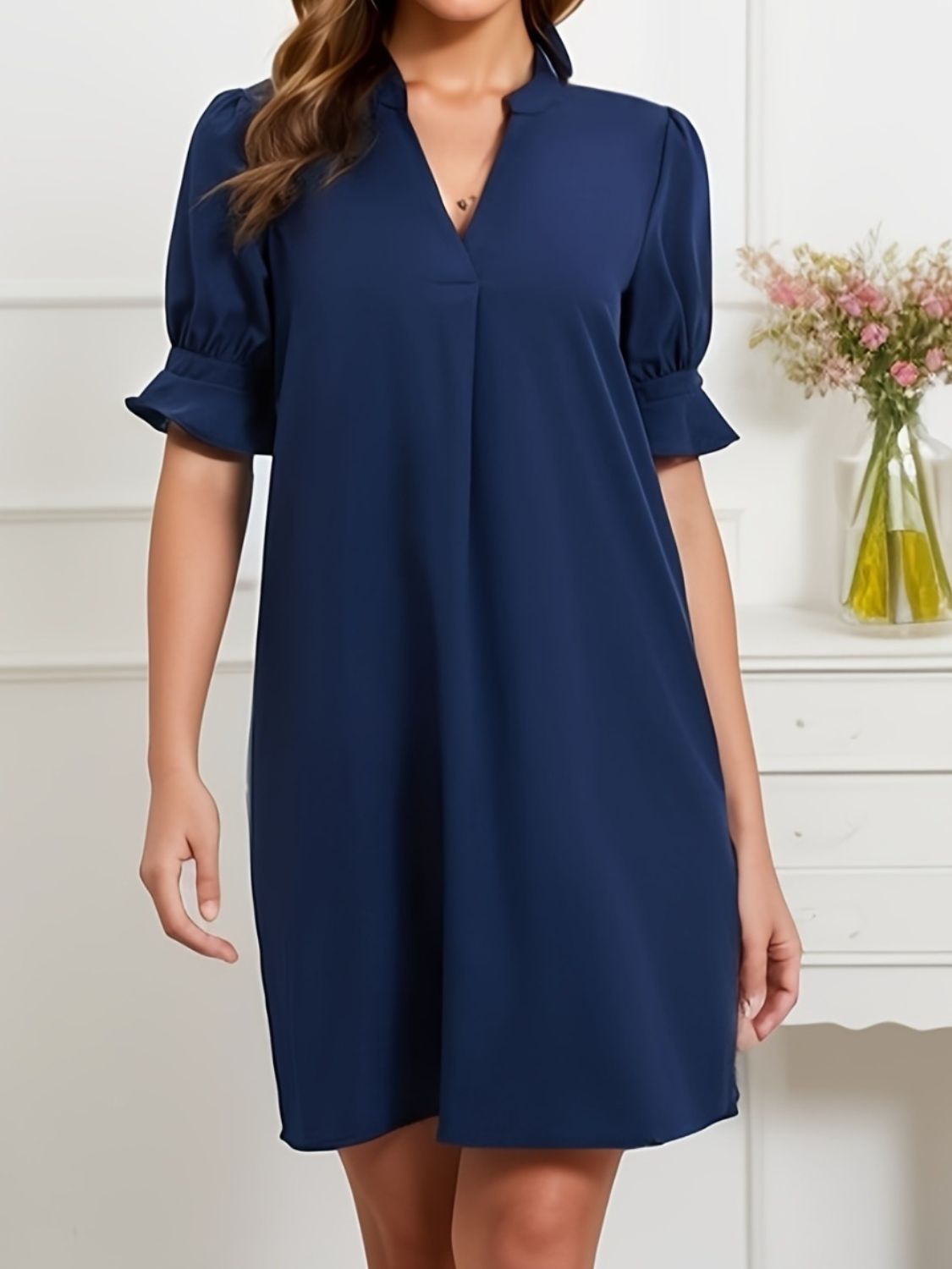 Stylish mini dress with flounce sleeves and a notched neckline, available in multiple colors for any event, casual or formal.