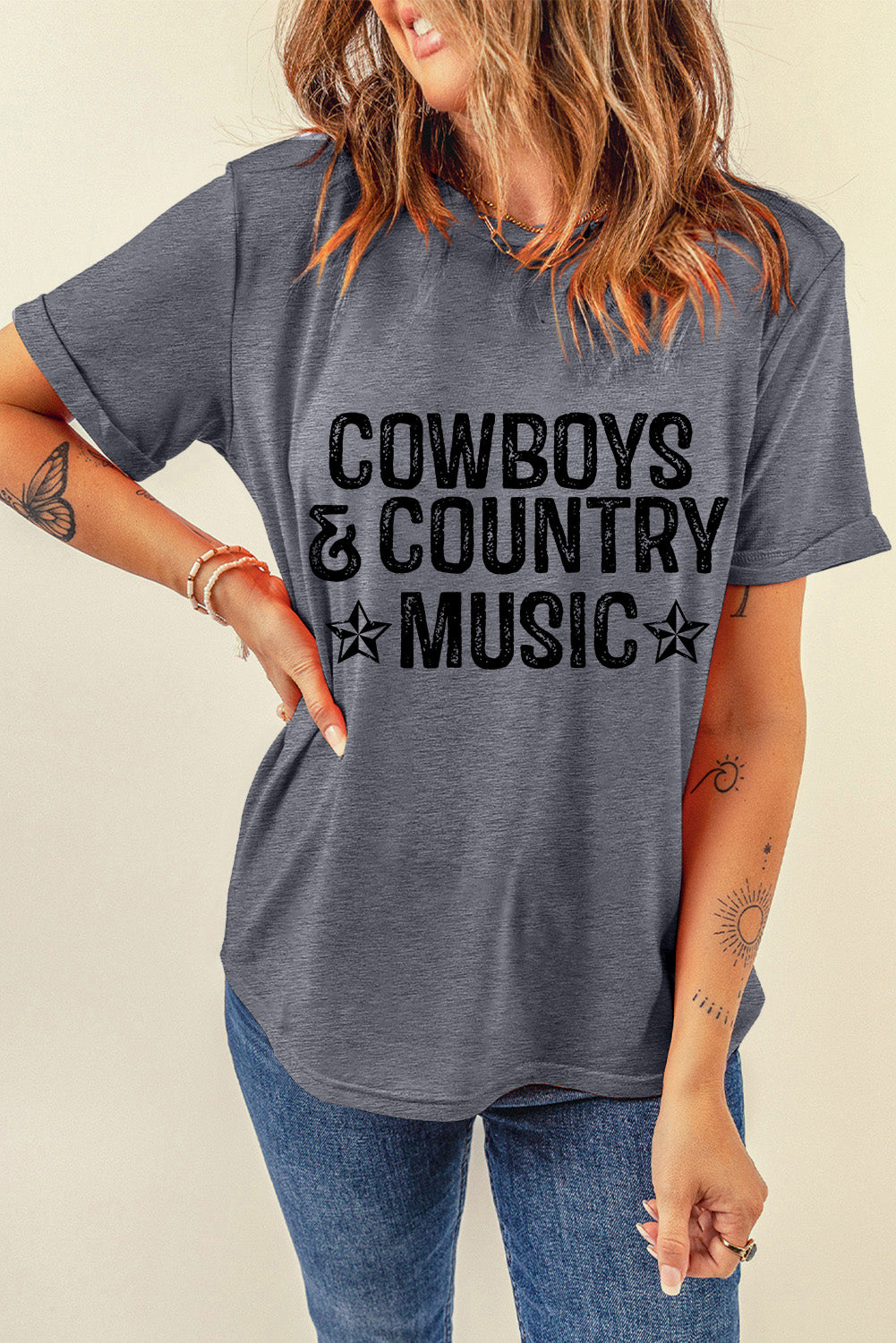 Casual gray t-shirt with black "Cowboy & Country Music" lettering