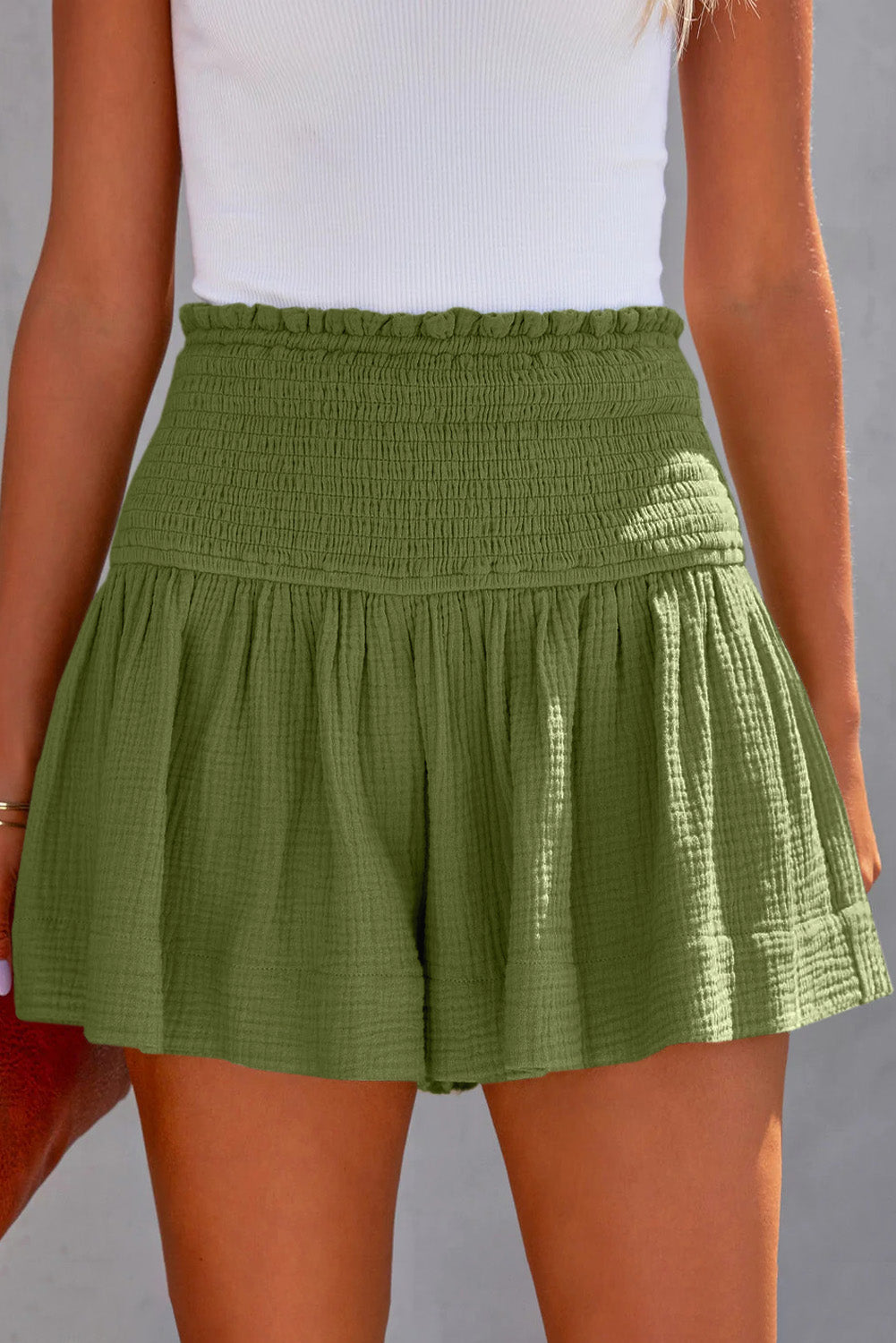 Shop versatile Smocked Waistband Shorts in black, moss, or blue. Perfect blend of style & comfort for any casual occasion.