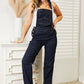 Classic blue denim overalls with a relaxed fit