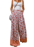 Vibrant floral palazzo pants with elastic waistband and charming hem details