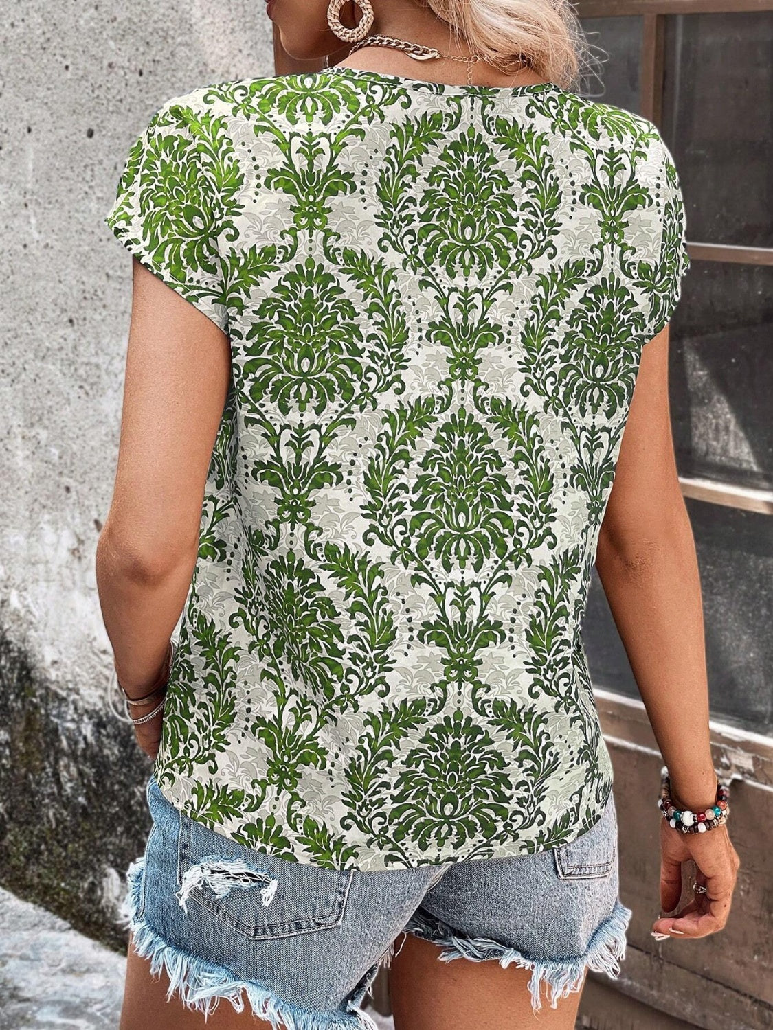 Elevate your style with our Printed Short Sleeve Blouse - available in blue, green, taupe. Perfect blend of comfort & chic fashion.