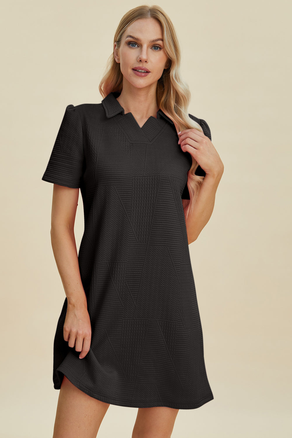Black textured dress with short sleeves and collar