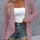 Soft and breathable pink open-front cardigan.