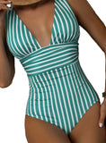 Discover your beach-ready look with our chic striped one-piece swimsuit. Featuring a flattering V-neck and stylish design, it's perfect for any summer outing.