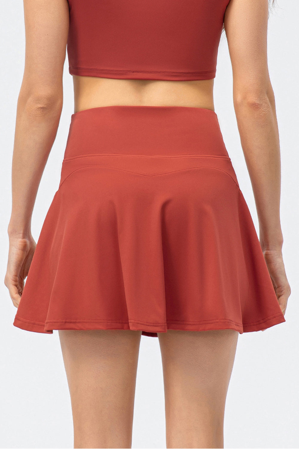 Shop the stylish High Waist Active Skirt with built-in shorts for comfort & elegance during your workouts or casual wear.