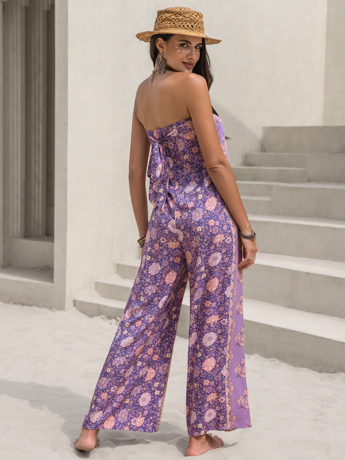 Embrace summer with our Printed Tube Wide Leg Jumpsuit. Perfect for any occasion, available in lilac, black, and camel. Shop now for effortless style!