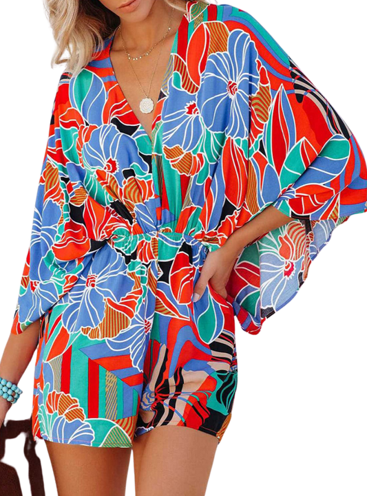 Step into summer with flair in our Tied Printed Kimono Sleeve Romper - perfect for any occasion with a striking, adjustable design