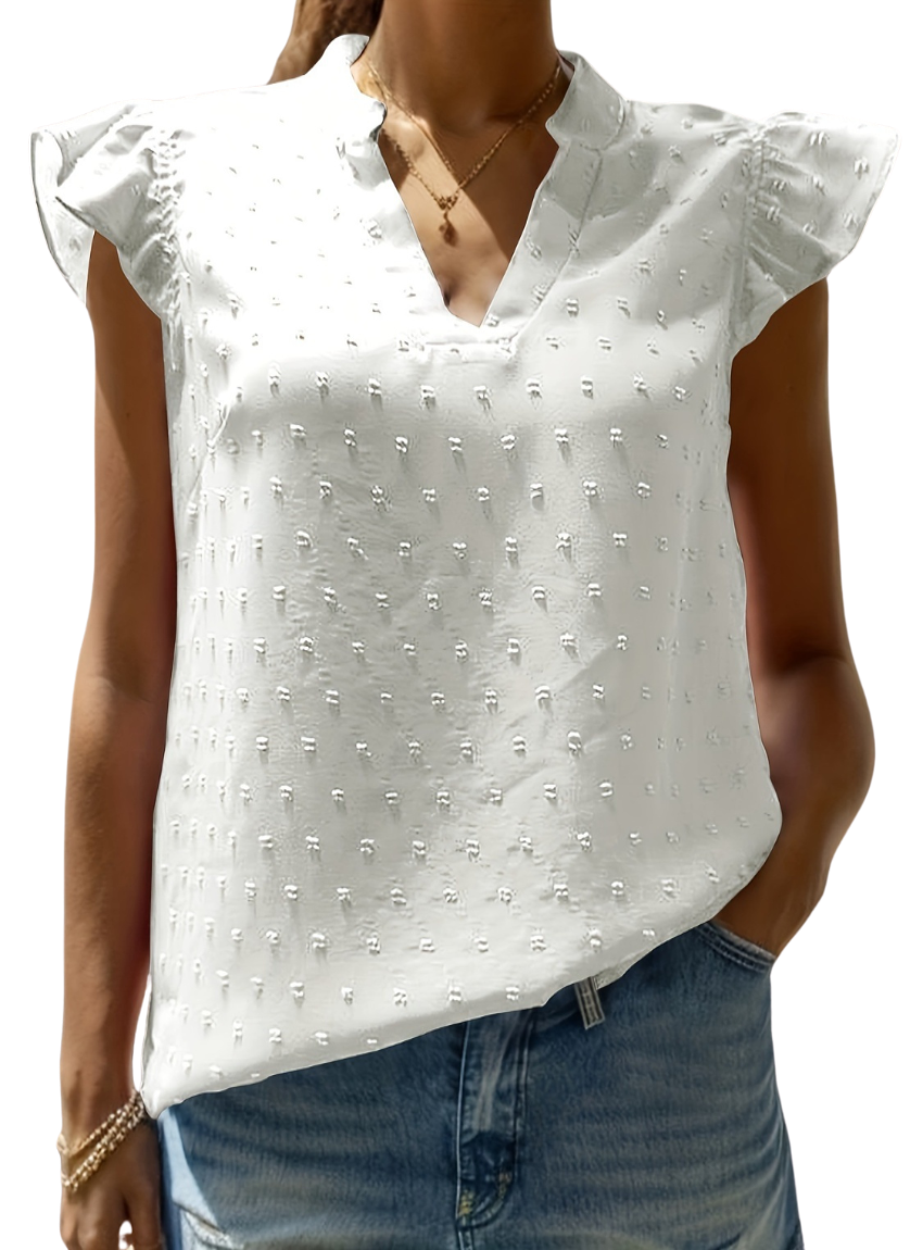 Elegant Swiss Dot Blouse with ruffled cap sleeves and a notched neckline, perfect for versatile styling. Available in white, black, blue, and pink.