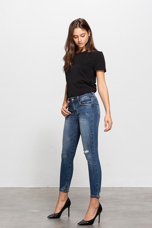 Casual wear option with Insane Gene mid-rise ankle skinny jeans featuring distressed detailing.