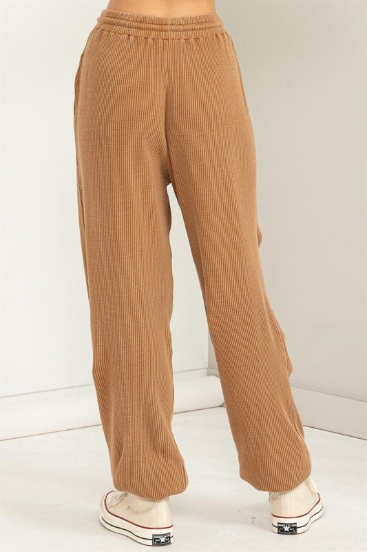 Relaxed-fit mocha lounge pants with side pockets for added style.
