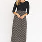 Elegant black tile maxi dress with chic design
