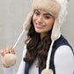 Elegant cable weave pom hat for cold weather





