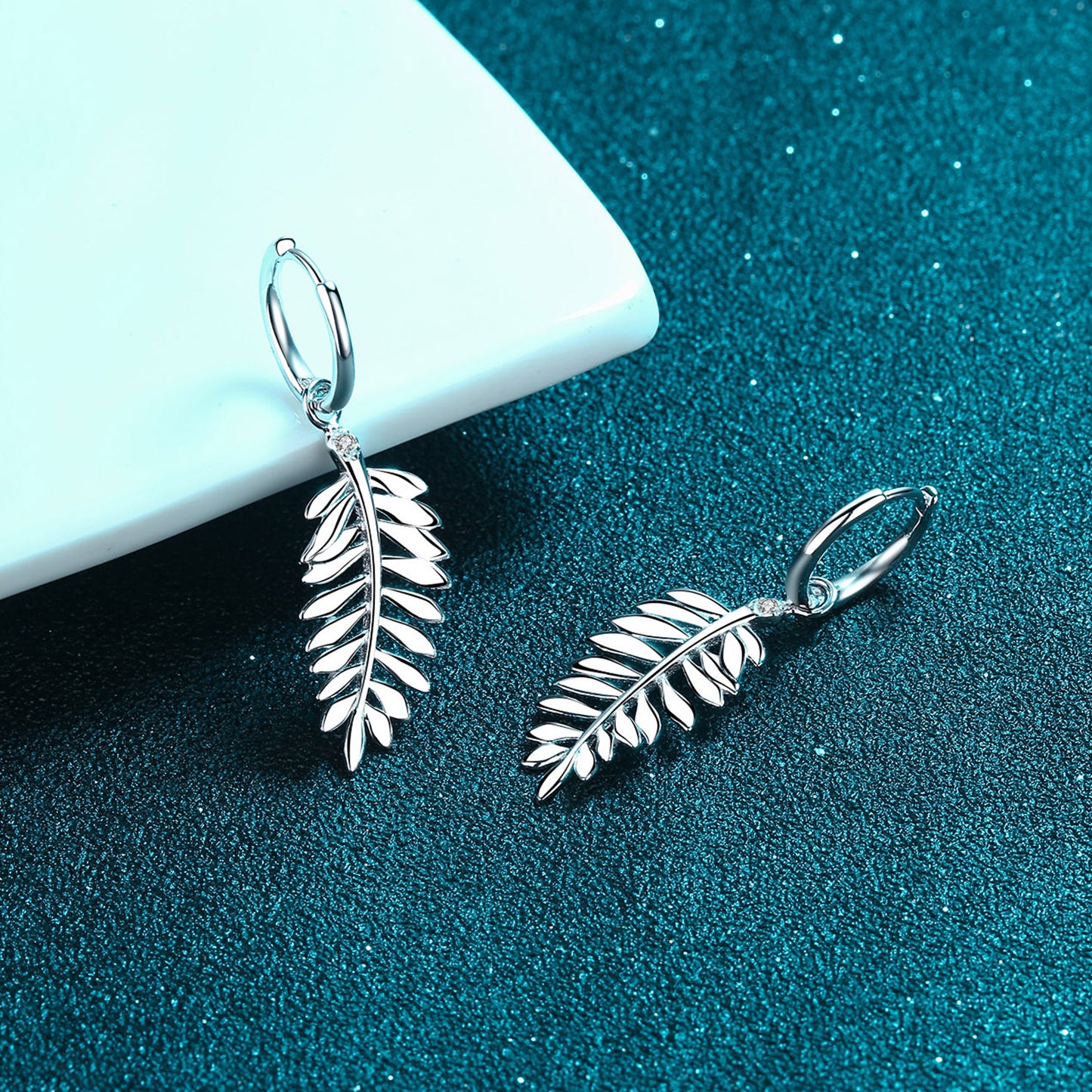 Elegant sterling silver earrings with leaf design
