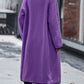 Women's elegant long purple sherpa coat, perfect for winter styling.
