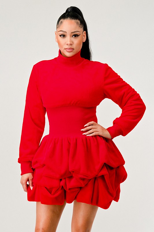 Elegant red dress featuring ruffles and long sleeves, perfect for evening events.
