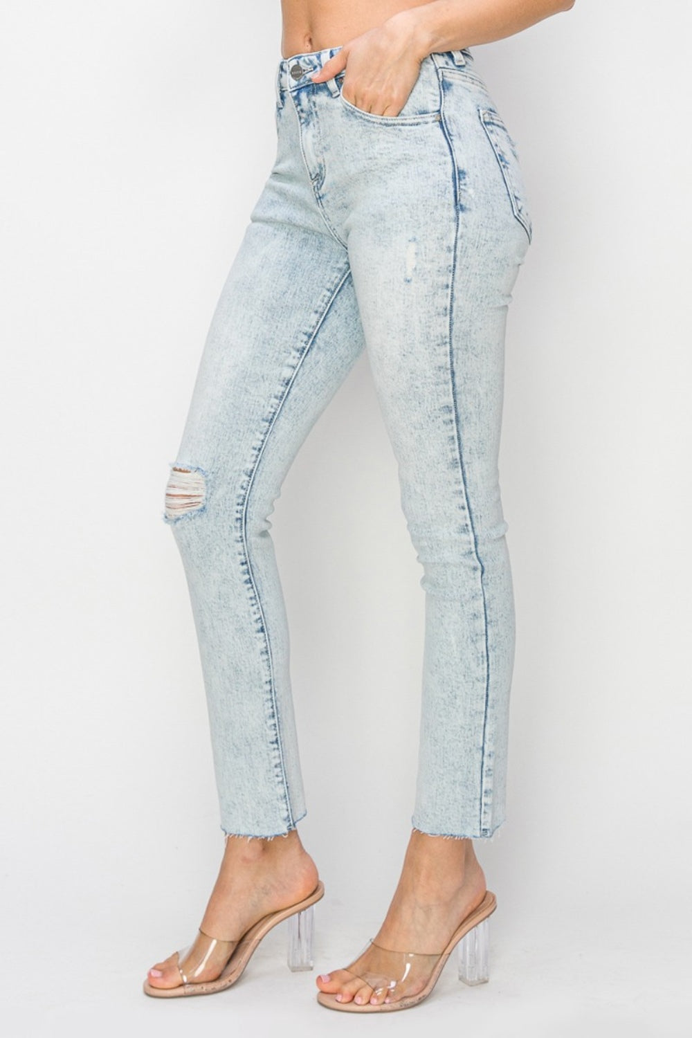 Subtly distressed high-rise skinny jeans in light-wash denim
