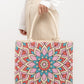Lightweight straw tote bag with vibrant dyed design