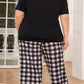 Lounge in style with our V-Neck Tee & Plaid Cropped Pants Set. Perfect blend of comfort and chic for everyday wear