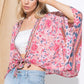 Bright pink kimono with floral design and breezy fabric.