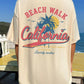 Versatile beige t-shirt with California beach-themed graphic