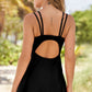 Chic Double-Strap Cutout Swim Dress in navy/black for stylish coverage and ultimate beach comfort. Perfect blend of elegance and playfulness.