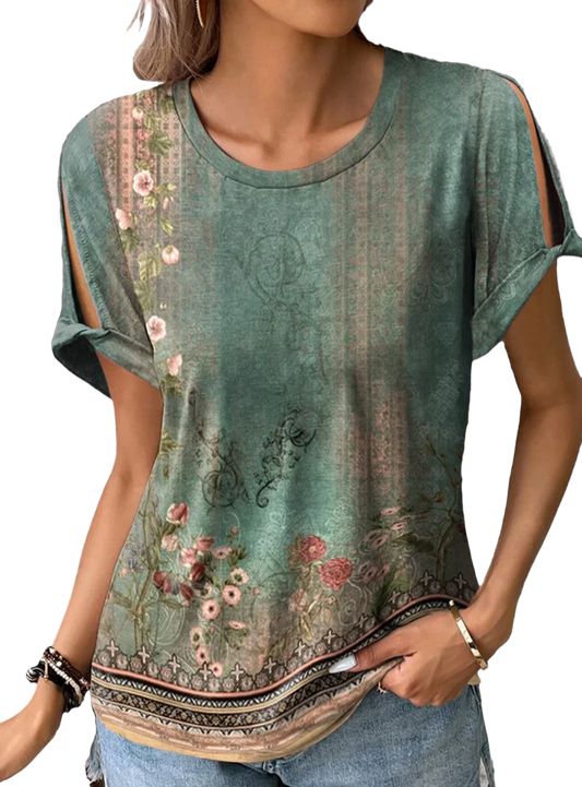 Chic cutout blouse with vintage floral print and a modern round neck for a perfect blend of style and comfort.