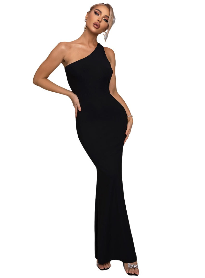 Elevate your style with our chic Cutout One-Shoulder Maxi Dress - perfect for any upscale occasion where elegance is a must