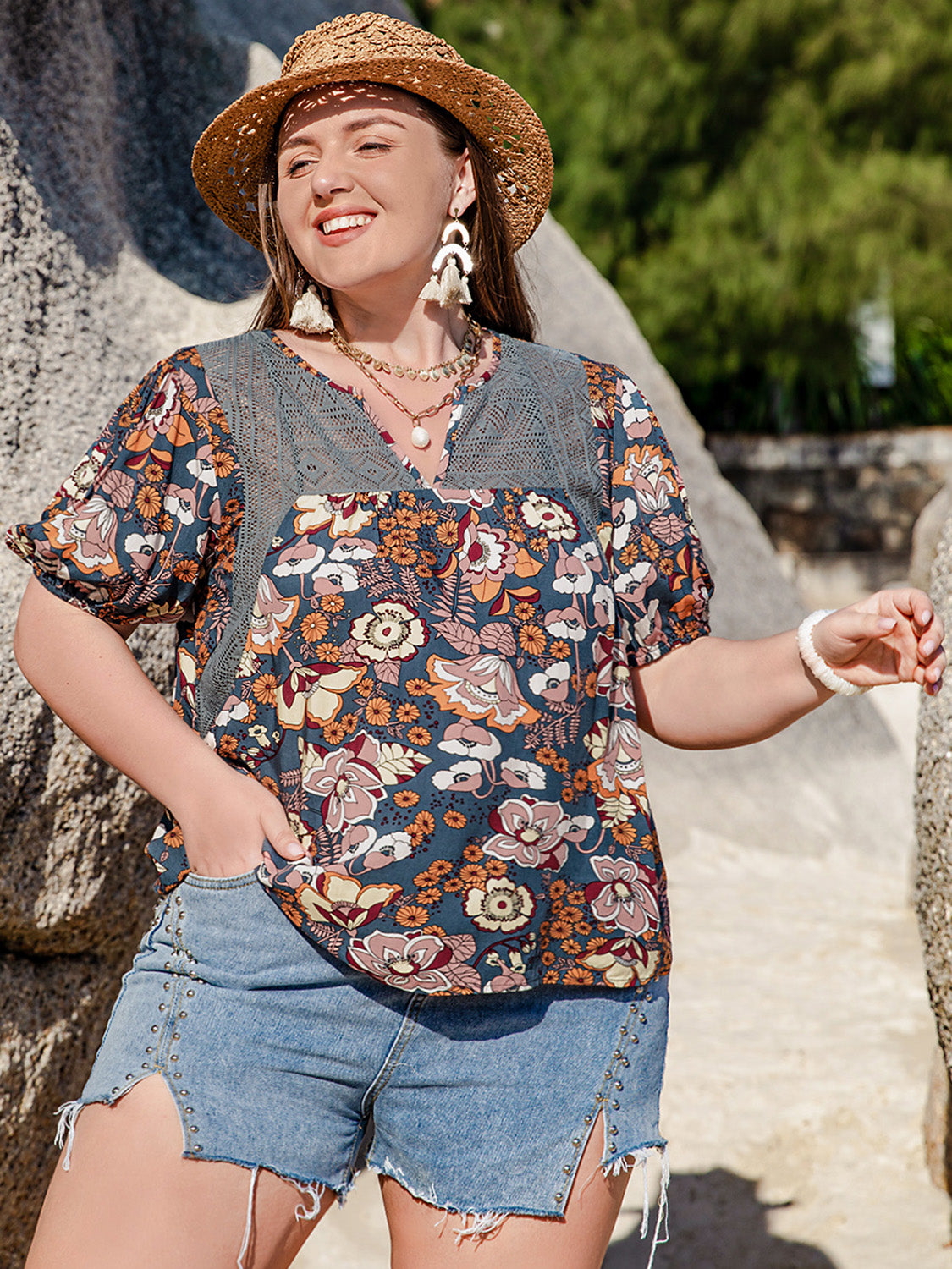 Plus size blouse featuring a charming floral pattern
