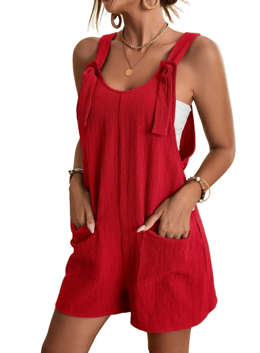 Chic romper with pockets and adjustable ties for the perfect fit. Ideal for a stylish, comfortable, and versatile summer wardrobe.