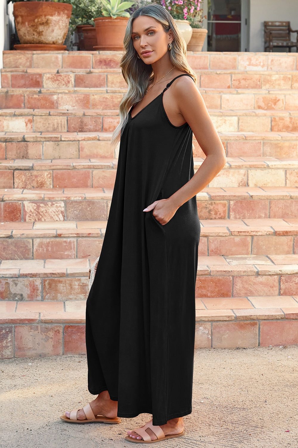 Elevate your style effortlessly with our V-Neck Spaghetti Strap Jumpsuit. Versatile, chic, and comfortable. Available in black and matcha green