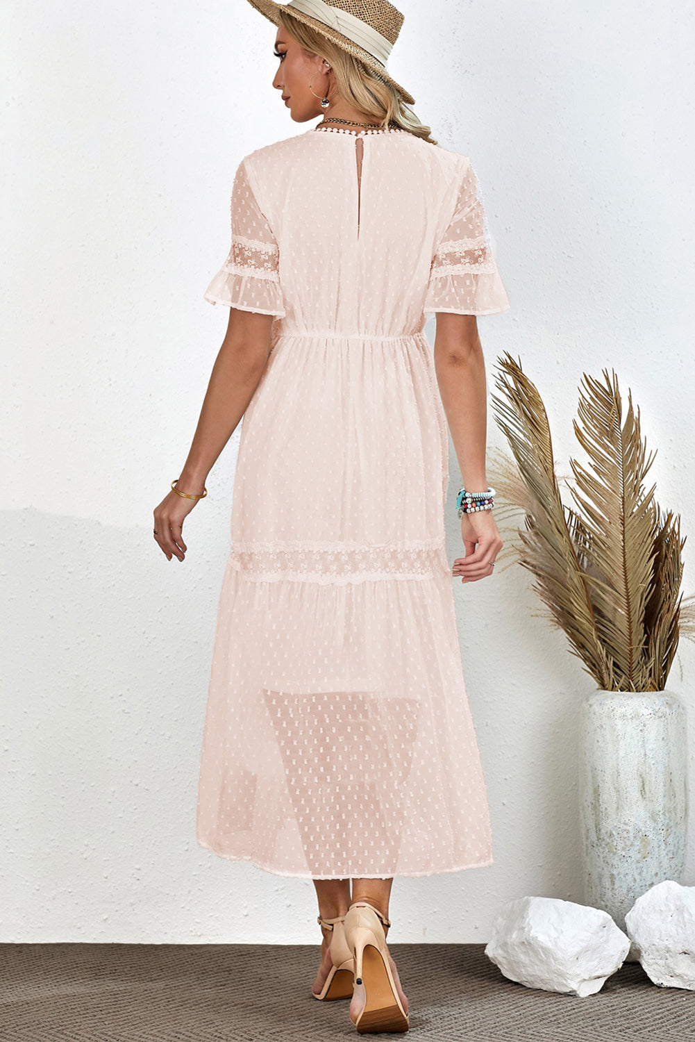 Chic Swiss Dot Midi Dress in white/peach, with a flattering V-neck and airy sleeves, perfect for summer days and elegant evenings.