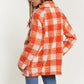 Chic boucle plaid coat for women, featuring side pockets and a lapel neck.
