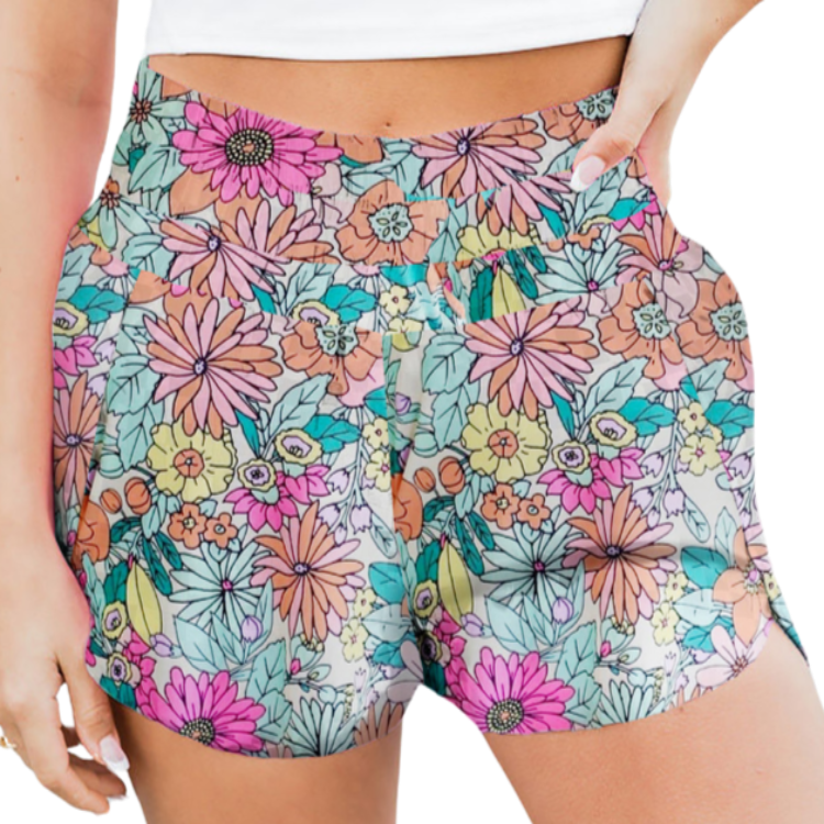 Embrace summer with our Floral Elastic Waist Shorts—perfect for style & comfort. Vibrant prints & breezy fabric for your sunny adventures!