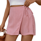 Chic pink high-waist skort with a flattering tie feature, blending elegance with comfort for everyday wear.