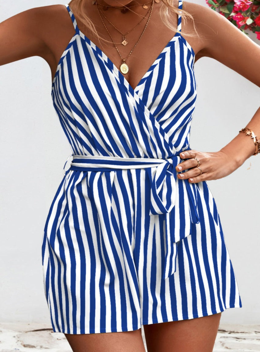 Summery striped romper with a flattering tie waist & adjustable straps. Perfect for any casual outing. Available in mustard, sky blue & black.