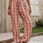 Pink boho chic drawstring pants with intricate pattern