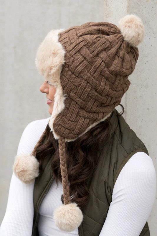 Fashionable faux fur pom trapper hat for winter
