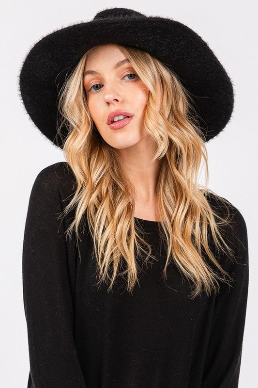 Fashionable fuzzy fedora for winter outfits
