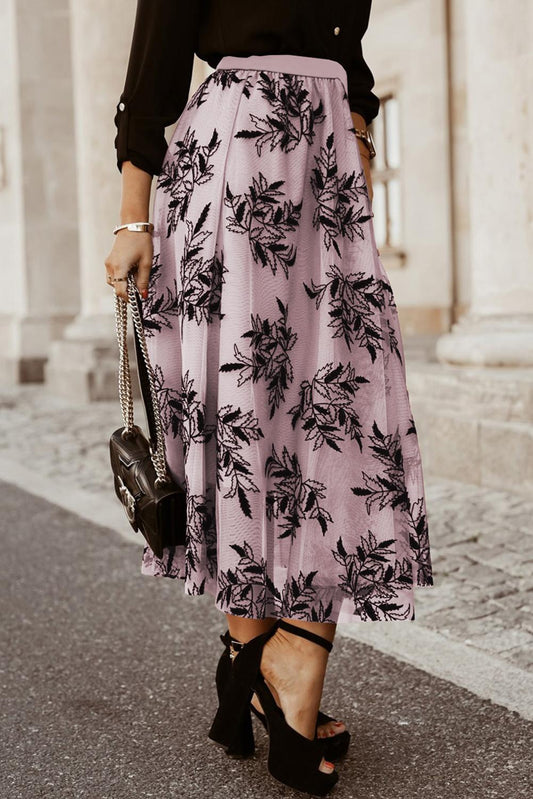 Stylish floral embroidered maxi skirt for casual and semi-formal occasions.
