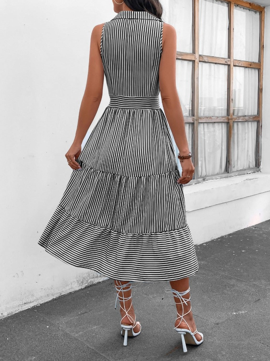 Chic striped midi dress with Johnny collar and waist cinching. Versatile, with pockets and available in 7 colors. Perfect for any occasion.