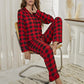 Classic plaid pajama set styled for holiday mornings.
