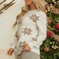 Side view of an ivory snowflake sweater with a relaxed fit, ideal for casual winter wear.