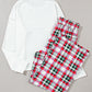 Holiday-themed plaid pajama set ideal for lounging or gift-giving.
