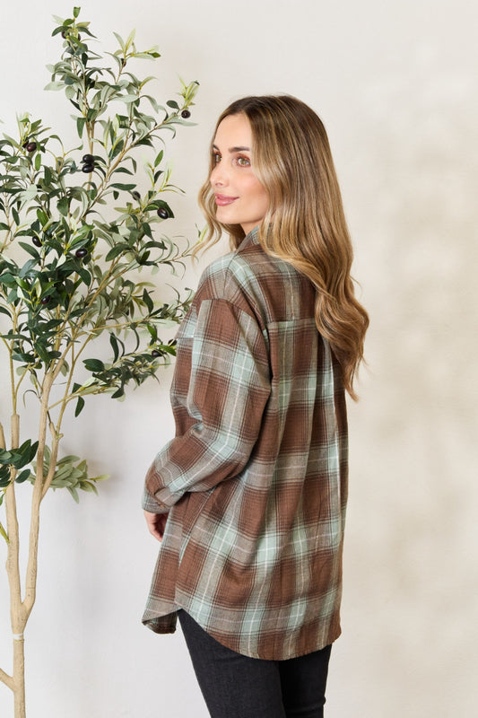 Relaxed fit plaid flannel shirt perfect for casual fall outfits.