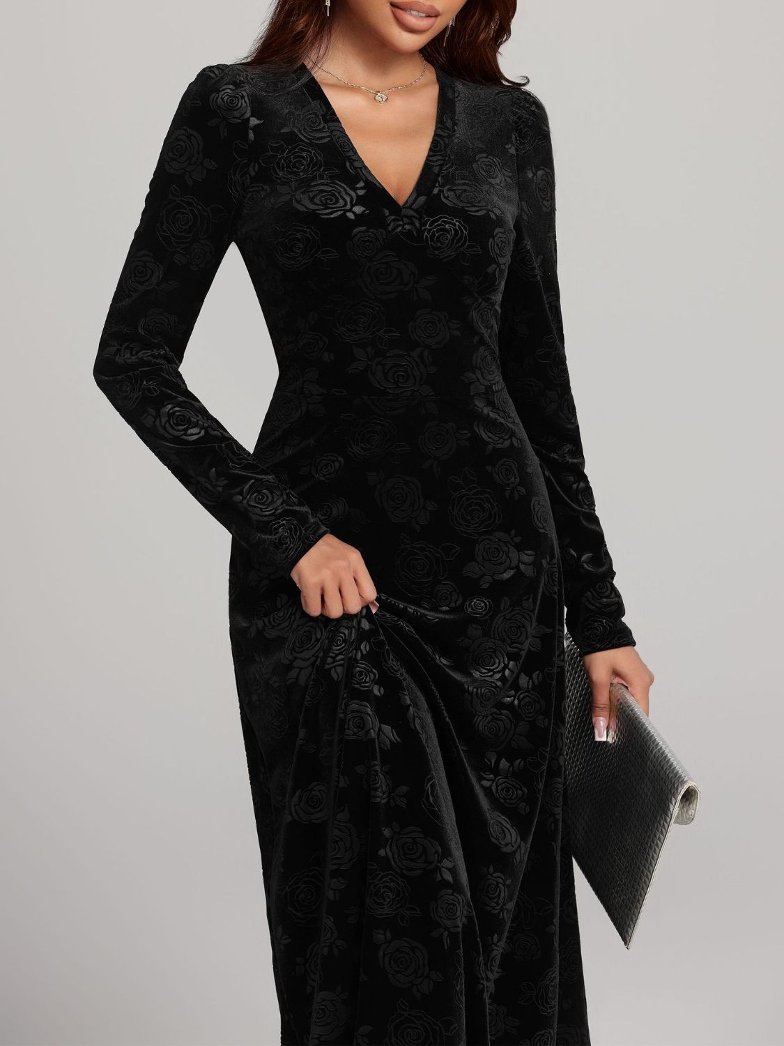 Floral embossed midi dress in black, ideal for evening events and gatherings.