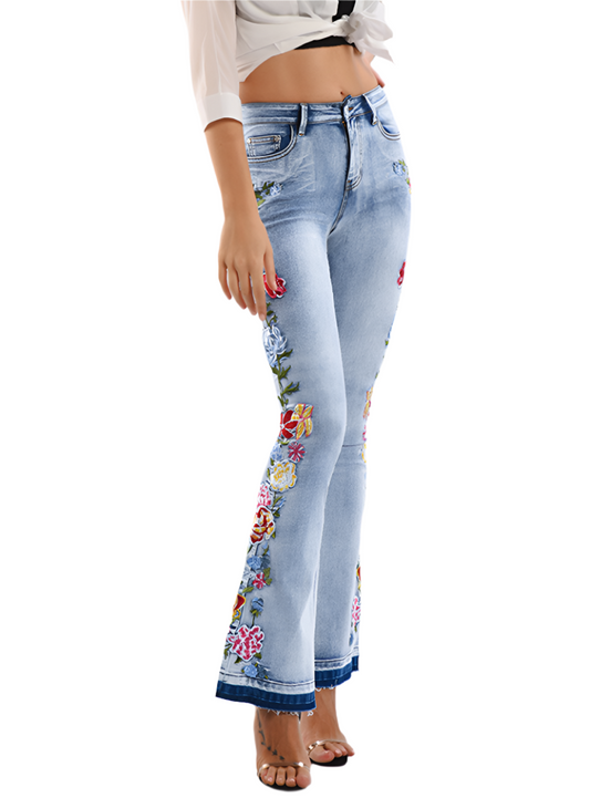 Front view of floral embroidered denim flare jeans with high waist.
