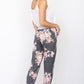 Charcoal jogger pants with blush floral print and adjustable drawstring waist
